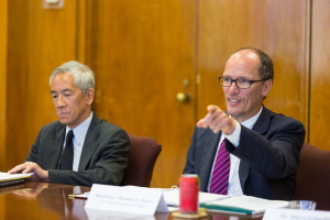 US Labor Secretary Thomas Perez (right) making a point in the meeting coordinated by Center for Faith-Based Partnerships Rev. Phil Tom (left)